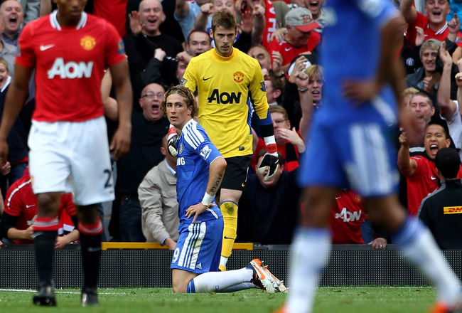 MANCHESTER, ENGLAND - SEPTEMBER 18:  Fernando Torres of Chelsea reacts after missing an open goal during the Barclays Premier League match between Manchester United and Chelsea at Old Trafford on September 18, 2011 in Manchester, England.  (Photo by Clive