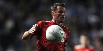 BRIGHTON, ENGLAND - SEPTEMBER 21:  Jamie Carragher of Liverpool in action during the Carling Cup Third Round match between Brighton & Hove Albion and Liverpool at the American Express Community Stadium on September 21, 2011 in Brighton, England.  (Photo b