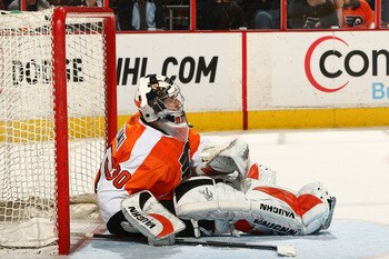PHILADELPHIA - MARCH 29:  Goalkeeper Antero Niittymaki #30 of the Philadelphia Flyers rests after making a save against the Boston Bruins at the Wachovia Center on March 29, 2009 in Philadelphia, Pennsylvania.  (Photo by Chris McGrath/Getty Images)