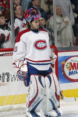 EAST RUTHERFORD, NJ - NOVEMBER 18:  Goaltender Jose Theodore #60 of the Montreal Canadians looks on for the national anthem before the game against the New Jersey Devils at the Continental Airlines Arena on November 18, 2005 in East Rutherford, New Jersey