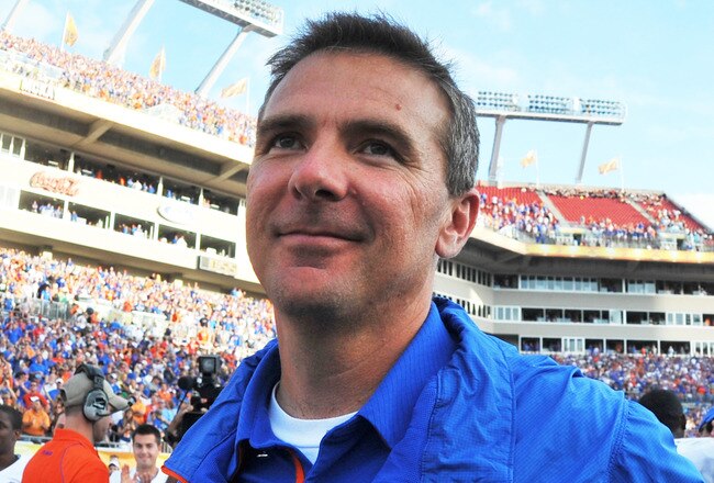 TAMPA, FL - JANUARY 1:  Coach Urban Meyer of the Florida Gators leaves the field after play against the Penn State Nittany Lions January 1, 2010 in the 25th Outback Bowl at Raymond James Stadium in Tampa, Florida.  (Photo by Al Messerschmidt/Getty Images)
