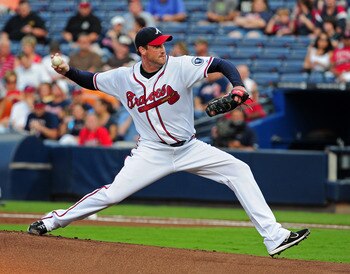 ATLANTA - AUGUST 31: Derek Lowe #32 of the Atlanta Braves pitches against the Washington Nationals at Turner Field on August 31, 2011 in Atlanta, Georgia. (Photo by Scott Cunningham/Getty Images)