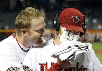 PHOENIX, AZ - SEPTEMBER 19:  Starting pitcher Ian Kennedy #31 of the Arizona Diamondbacks receives a shaving cream salute from J.J. Putz #40 after defeating the Pittsburgh Pirates in the Major League Baseball game at Chase Field on September 19, 2011 in P