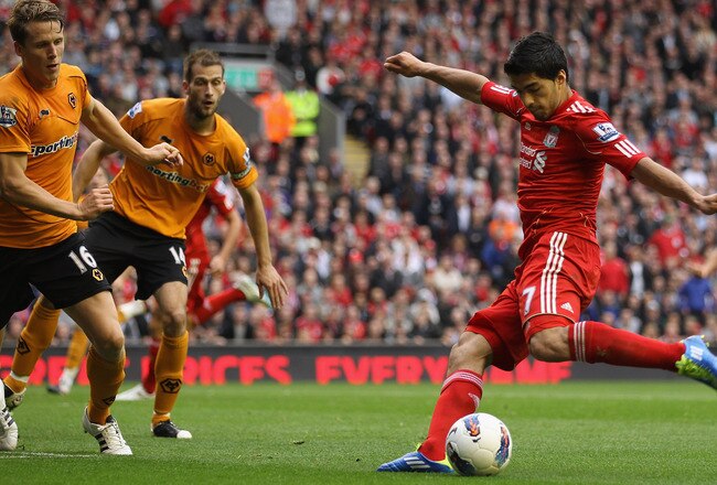 LIVERPOOL, ENGLAND - SEPTEMBER 24:  Luis Suarez of Liverpool scores the second goal during the Barclays Premier League match between Liverpool and Wolverhampton Wanderers at Anfield on September 24, 2011 in Liverpool, England.  (Photo by Clive Brunskill/G