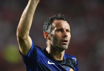 LISBON, PORTUGAL - SEPTEMBER 14:  Ryan Giggs of Manchester United celebrates his goal during the UEFA Champions League Group C match between SL Benfica and Manchester United at the Estadio da Luz on September 14, 2011 in Lisbon, Portugal.  (Photo by Clive