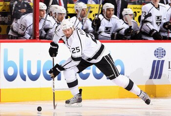 GLENDALE, AZ - SEPTEMBER 21:  Dustin Penner #25 of the Los Angeles Kings skates with the puck during the preseason NHL game against the Phoenix Coyotes at Jobing.com Arena on September 21, 2011 in Glendale, Arizona.  The Kings defeated the Coyotes 3-2. (P
