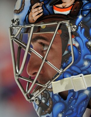 UNIONDALE, NY - SEPTEMBER 24: Al Montoya #35 of the New York Islanders looks on during the pregame warm-up prior to the preseason game against the New Jersey Devils at Nassau Coliseum on September 24, 2011 in Uniondale, New York. (Photo by Christopher Pas