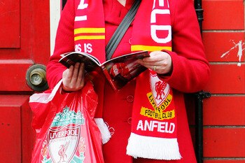 LIVERPOOL, UNITED KINGDOM - FEBRUARY 24: A female fan before the Barclays Premiership match between Liverpool and Sheffield United at Anfield on February 24, 2007 in Liverpool, England. (Photo by Laurence Griffiths/Getty Images)