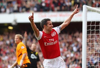 LONDON, ENGLAND - SEPTEMBER 24:  Robin Van Persie of Arsenal celebrates his second goal during the Barclays Premier League match between Arsenal and Bolton Wanderers at Emirates Stadium on September 24, 2011 in London, England.  (Photo by Clive Mason/Gett