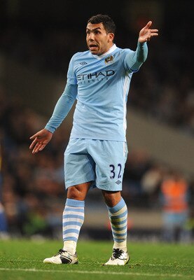MANCHESTER, ENGLAND - SEPTEMBER 21: Carlos Tevez of Manchester City gestures during the Carling Cup Third Round match between Manchester City and Birmingham City at the Etihad Stadium on September 21, 2011 in Manchester, England.  (Photo by Michael Regan/