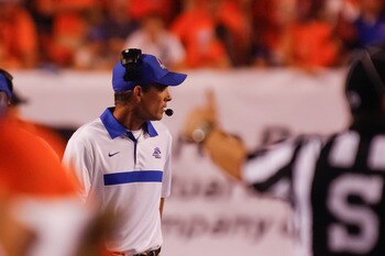 BOISE, ID - SEPTEMBER 24:  Head Coach Chris Petersen of the Boise State Broncos watches a play against the Tulsa Golden Hurricane at Bronco Stadium on September 24, 2011 in Boise, Idaho.  (Photo by Otto Kitsinger III/Getty Images)