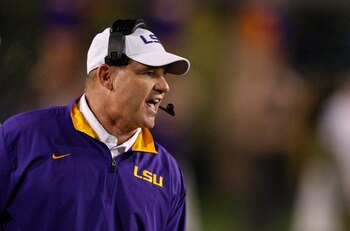 MORGANTOWN, WV - SEPTEMBER 24: Head coach Les Miles of the Louisiana State University Tigers talks to his players during the game against the West Virginia Mountaineers on September 24, 2011 at Mountaineer Field in Morgantown, West Virginia.  (Photo by Ja