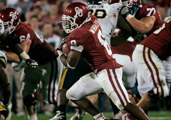 NORMAN, OK - SEPTEMBER 24:  Running back Dominique Whaley #8 of the Oklahoma Sooners rushes up field during the second half against the Missouri Tigers on September 24, 2011 at Gaylord Family-Oklahoma Memorial Stadium in Norman, Oklahoma.  Oklahoma defeat