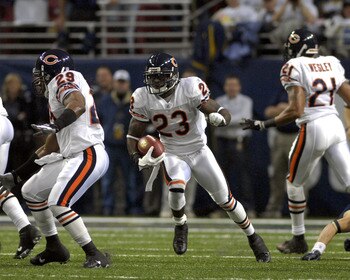 Chicago Bears cornerback Devin Hester returns a kickoff   against the St. Louis Rams on ESPN Monday Night Football Dec. 11, 2006 in St. Louis.  The Bears won 42 - 27 and Hester returned two kicks for TDS.  (Photo by Al Messerschmidt/Getty Images)