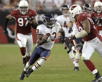 Chicago Bears cornerback Devin Hester returns a kick 83 yards for a game-winning touchdown  against the Arizona Cardinals Oct. 16, 2006 in Phoenix.  The Bears won 24 - 23 on Monday Night Football and remained undefeated.  (Photo by Al Messerschmidt/Getty