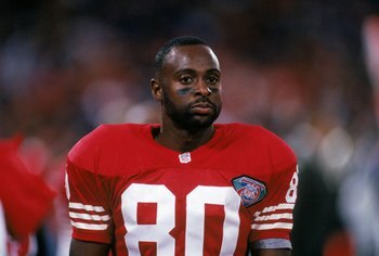 SAN FRANCISCO - AUGUST 26:  Wide receiver Jerry Rice #80 of the San Francisco 49ers looks on during a preseason game against the Seattle Seahawks at Candlestick Park on August 26, 1994 in San Francisco, California.  The 49ers won 13-9.  (Photo by George R
