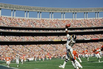 SAN DIEGO Ð 1987:  Wide receiver Wes Chandler #89 of the San Diego Chargers reaches for a pass at the endzone during a 1987 NFL game against the Denver Broncos at Jack Murphy Stadium in San Diego, California. (Photo by Stephen Dunn/Getty Images)