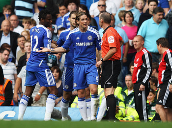 LONDON, ENGLAND - SEPTEMBER 24:  Fernando Torres of Chelsea is sent off by referee Mike Dean during the Barclays Premier League match between Chelsea and Swansea City at Stamford Bridge on September 24, 2011 in London, England.  (Photo by Clive Rose/Getty