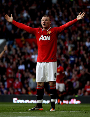MANCHESTER, ENGLAND - SEPTEMBER 18:  Wayne Rooney of Manchester United reacts during the Barclays Premier League match between Manchester United and Chelsea at Old Trafford on September 18, 2011 in Manchester, England.  (Photo by Clive Brunskill/Getty Ima