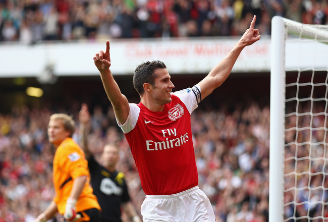 LONDON, ENGLAND - SEPTEMBER 24:  Robin Van Persie of Arsenal celebrates his second goal during the Barclays Premier League match between Arsenal and Bolton Wanderers at Emirates Stadium on September 24, 2011 in London, England.  (Photo by Clive Mason/Gett