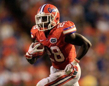 GAINESVILLE, FL - SEPTEMBER 03:  Jeff Demps #28 of the University Florida Gators runs for yardage during a game against the Florida Atlantic University Owls at Ben Hill Griffin Stadium on September 3, 2011 in Gainesville, Florida.  (Photo by Sam Greenwood
