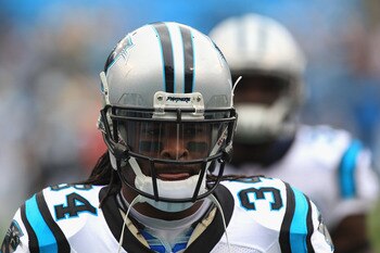 CHARLOTTE, NC - SEPTEMBER 18:  DeAngelo Williams #34 of the Carolina Panthers of the Carolina Panthers during their game against the Green Bay Packers at Bank of America Stadium on September 18, 2011 in Charlotte, North Carolina.  (Photo by Streeter Lecka