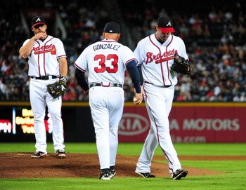 Possible Caption for Photo: "Maybe next game they'll spot us 5 runs like you do for them each game."