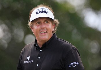ATLANTA, GA - SEPTEMBER 25:  Phil Mickelson walks off the fifth tee during the final round of the TOUR Championship at East Lake Golf Club on September 25, 2011 in Atlanta, Georgia.  (Photo by Sam Greenwood/Getty Images)