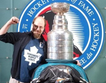 Ignore the Doug Gilmore shirt (a tourist purchase) and pay attention my the jacket at the base of Lord Stanley's Cup