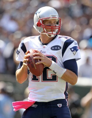 OAKLAND, CA - OCTOBER 02:  Tom Brady #12 of the New England Patriots in action against the Oakland Raiders at O.co Coliseum on October 2, 2011 in Oakland, California.  (Photo by Ezra Shaw/Getty Images)