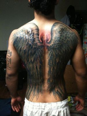 female wing tattoos