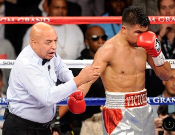 Victor Ortiz is held accountable by the referee for his actions.