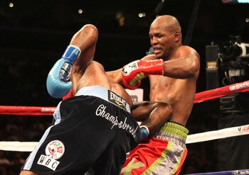 Dawson knocks Hopkins out of the clinch using his shoulder.
