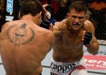Tyson Griffin delivering a solid right hand