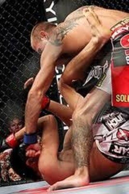 Donald Cerrone finishing Charles Oliveira