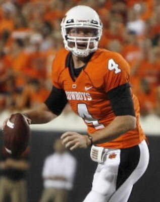 28 year-old Brandon Weeden threw for over 4,200 yards last year to lead Oklahoma State's high-powered offense.