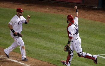 Napoli celebrates his assist on the final put-out of the Rangers' game 5 win.
