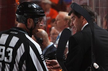 Laviolette engages in a heart to heart with on of the linesmen.