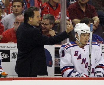 Tortorella practicing some form of martial arts on an unknowing Ruslan Fedotenko.