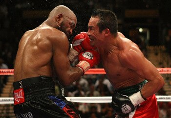 Casamayor (left) and Marquez face off in a great fight.