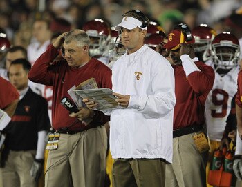 Lane Kiffin and coaches during the USC victory over Notre Dame in South Bend this season