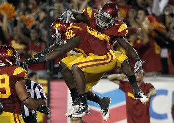 USC battled No. 4 (AP) Stanford only to lose by a fumble in the 3rd OT. The Trojans played well and should have won except for a few mistakes.
