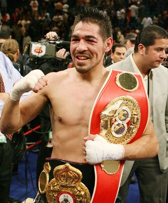 Antonio Margarito holding the gold he took from Cotto.
