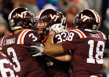 ATLANTA, GA - NOVEMBER 10:  Chris Drager #33 of the Virginia Tech Hokies celebrates his touchdown against the Georgia Tech Yellow Jackets with Logan Thomas #3 and D.J. Coles #18 at Bobby Dodd Stadium on November 10, 2011 in Atlanta, Georgia.  (Photo by Ke