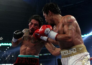 Tony gives as good as he gets from Pacquiao.