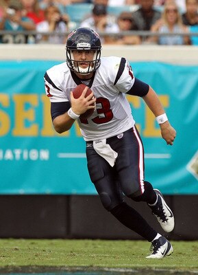JACKSONVILLE, FL - NOVEMBER 27:  T.J Yates #13 of the Houston Texans scrambles for yardage during the game against the Jacksonville Jaguars at EverBank Field on November 27, 2011 in Jacksonville, Florida.  (Photo by Sam Greenwood/Getty Images)