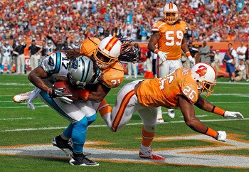 Legedu Naanee (17) scores a touchdown against Tampa Bay