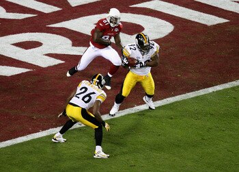 Harrison returned this interception 100 yards for a touchdown in one of the greatest plays in Super Bowl history.