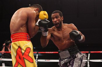 Amir Khan trying to defend against Lamont Peterson