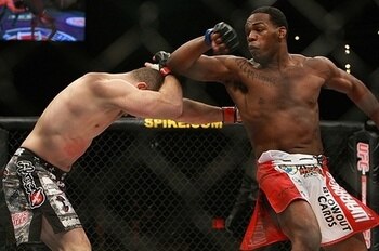 Jon Jones' signature back-elbow. (Photo courtesy MMAfighting.com)
